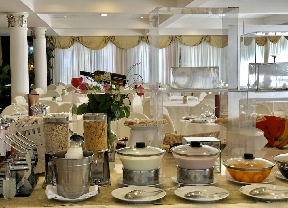 Фото Domizia Palace Hotel