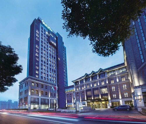 Внешний вид отеля Sunrise on the Bund в Хункоу, фото 1