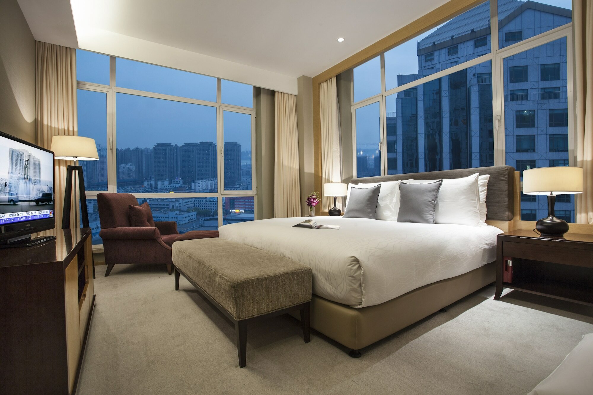 Фото Somerset Grand Central Dalian