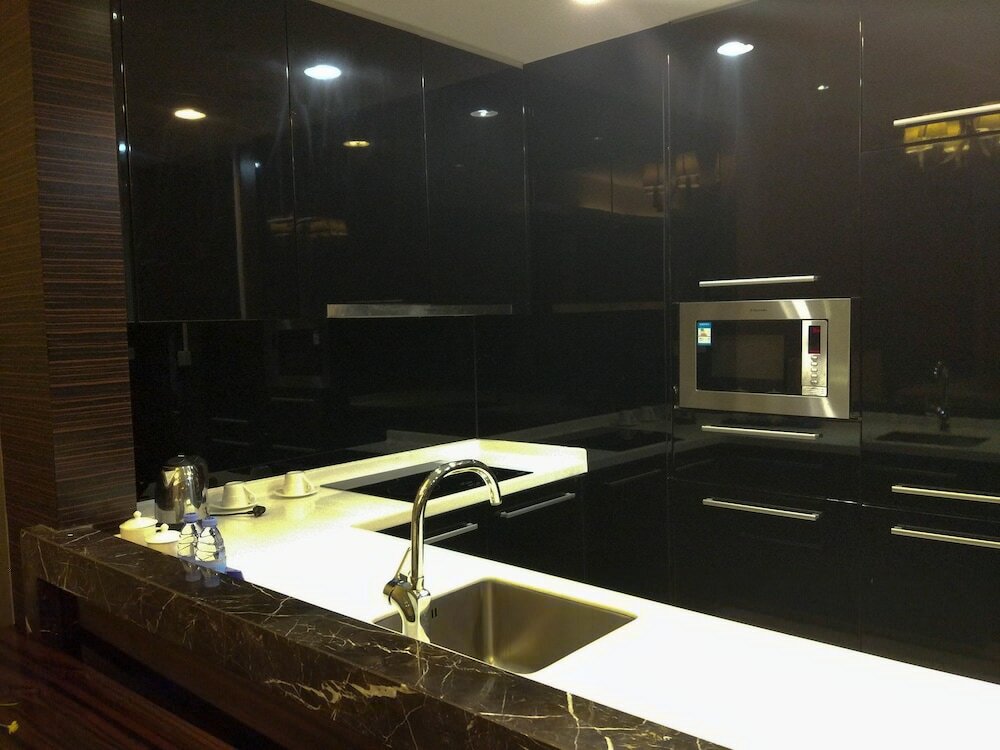 Фото Xingyi International Hotel Poly Store