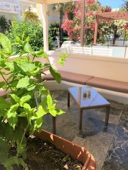 Фото Mimosa Suites