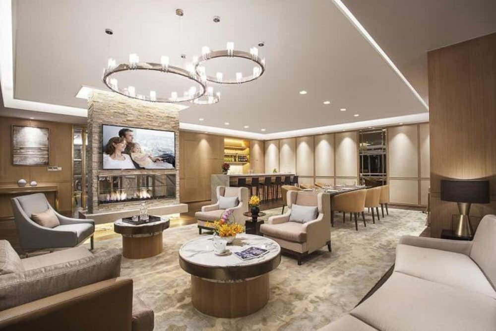 Фото Somerset Grand Central Dalian