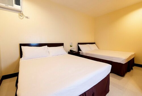 Гостиница Winzelle Suites в Замбоанге