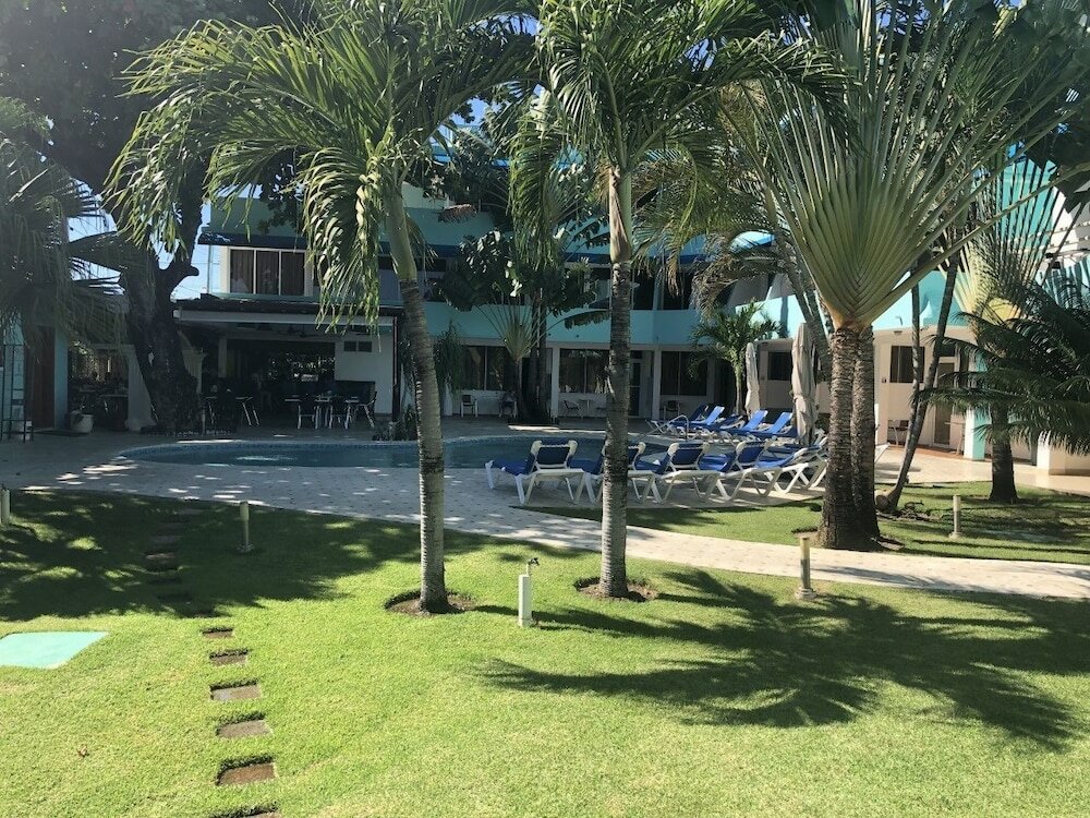 Фото New Garden Hotel