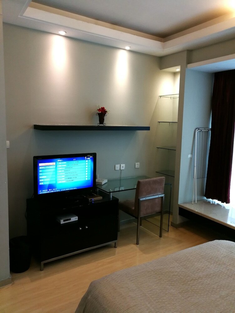 Фото Shanghai Abest Xinshikong Apartments