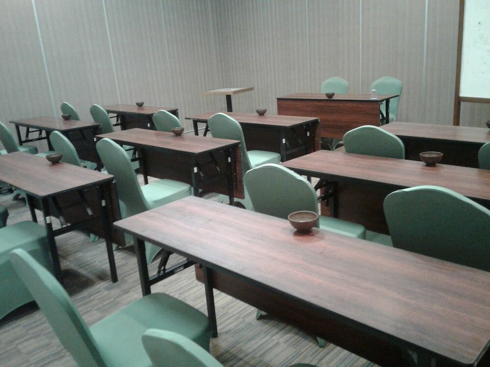 Фото Opi Indah Hotel