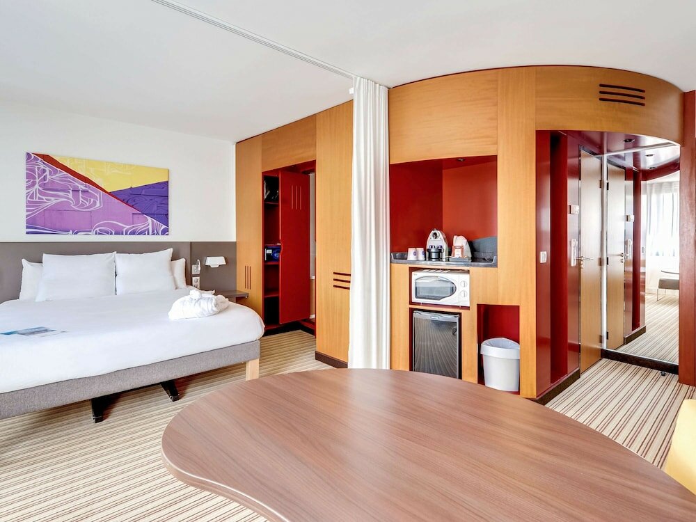 Фото Novotel Suites Paris Nord 18ème Hotel