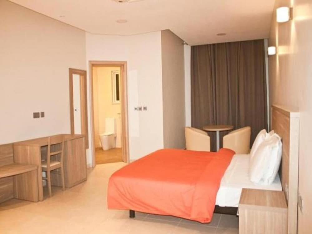 Фото Axis Suites