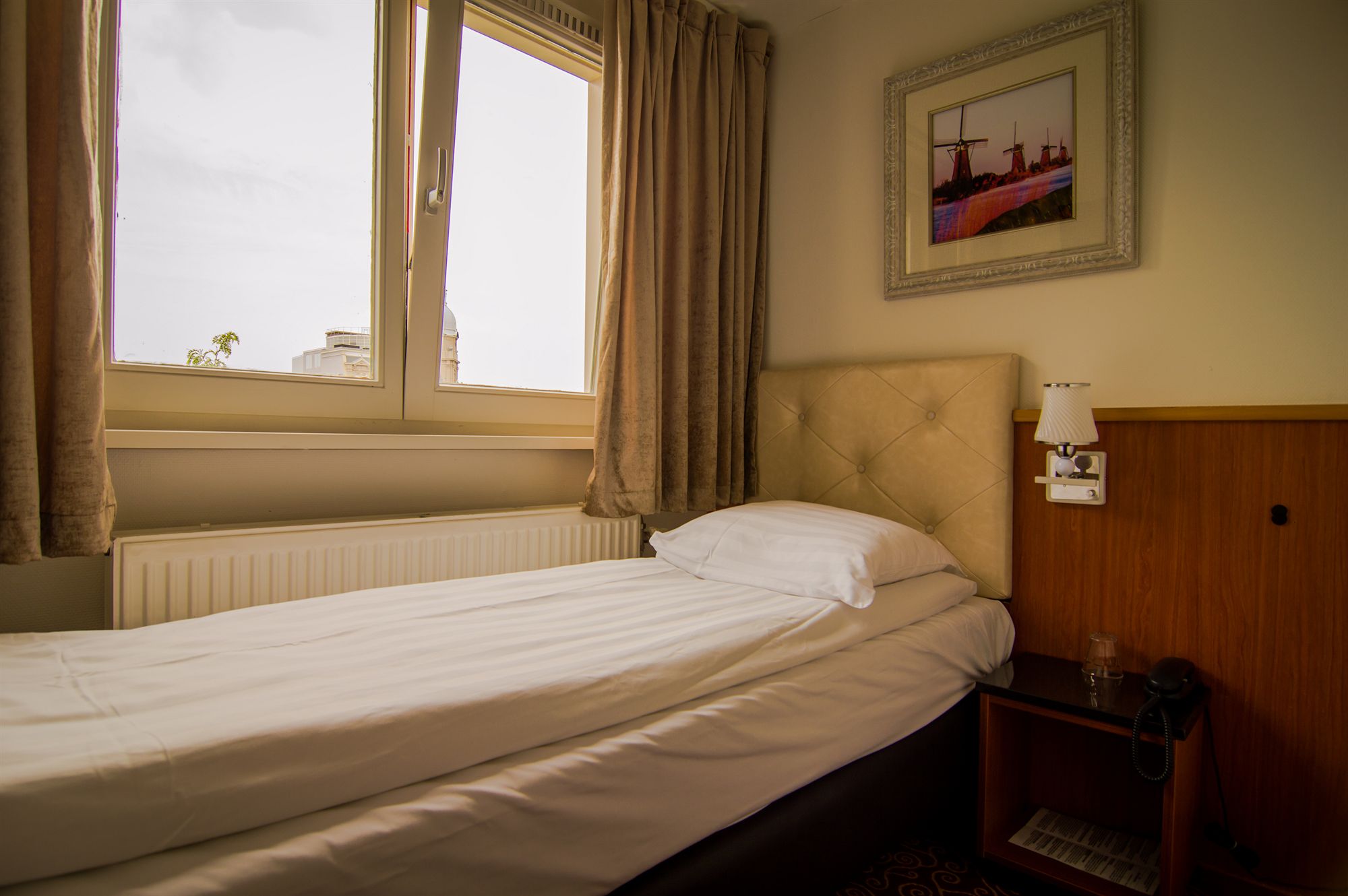 Фото Amsterdam Downtown Hotel