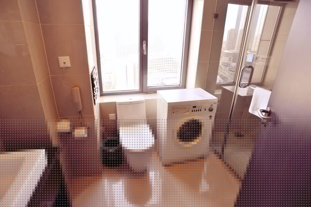 Фото Qingdao Housing International Hotel