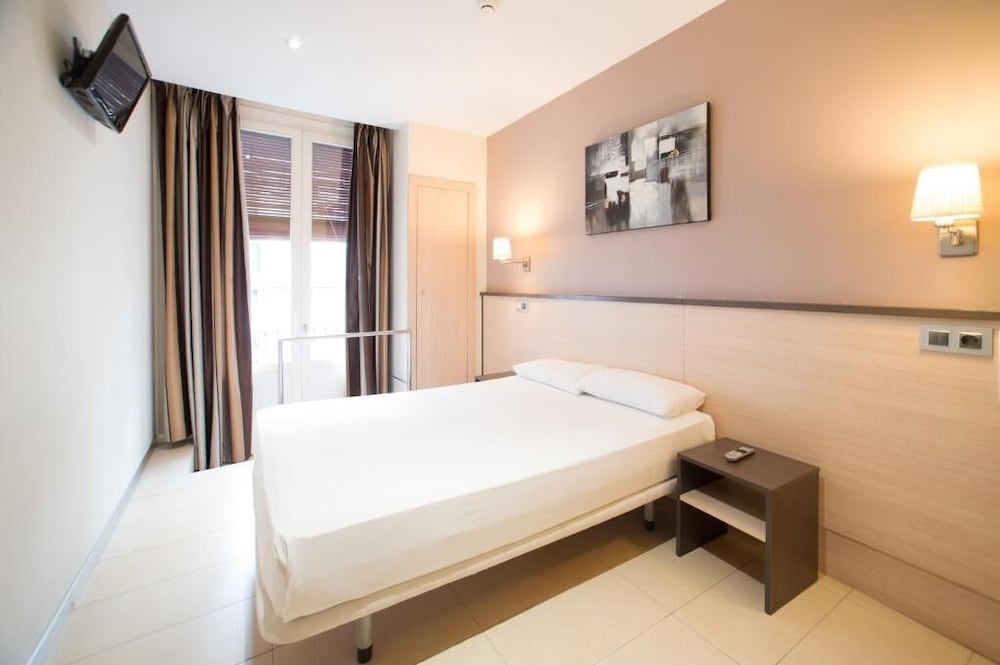 Фото Hostal Las Flores