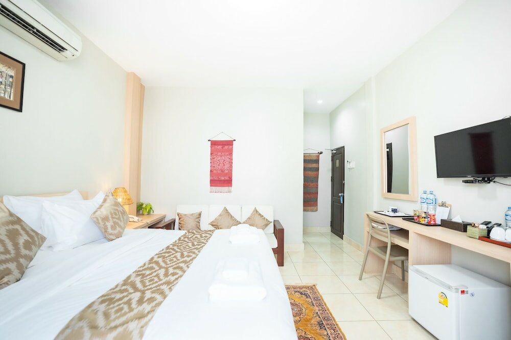 Фото Vongkhamsene Boutique Hotel