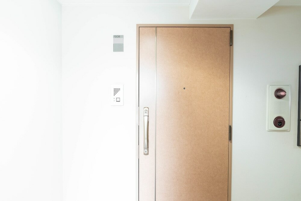 Фото Shinsaibash East Nana Apartment · Junan