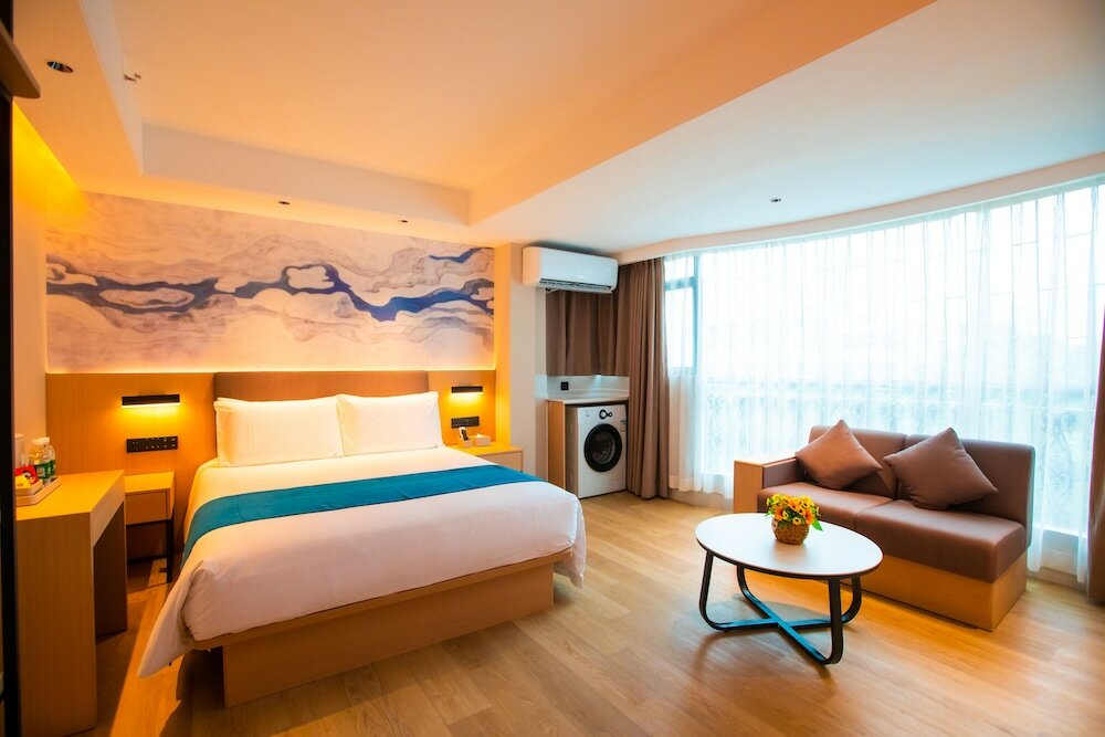 Фото Naive L Executive Apartments Coast City