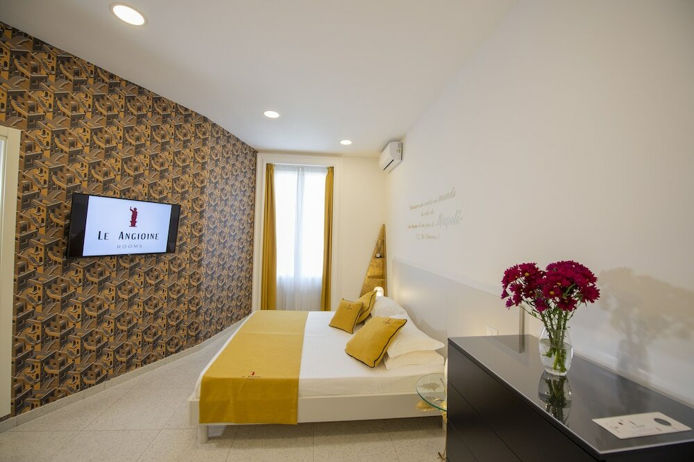 Фото Le Angioine Rooms