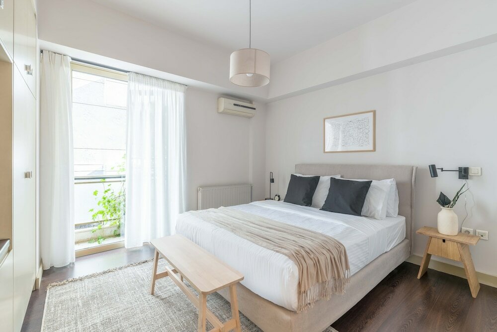 Фото Panoramic 1br Apt near Kallimarmaro