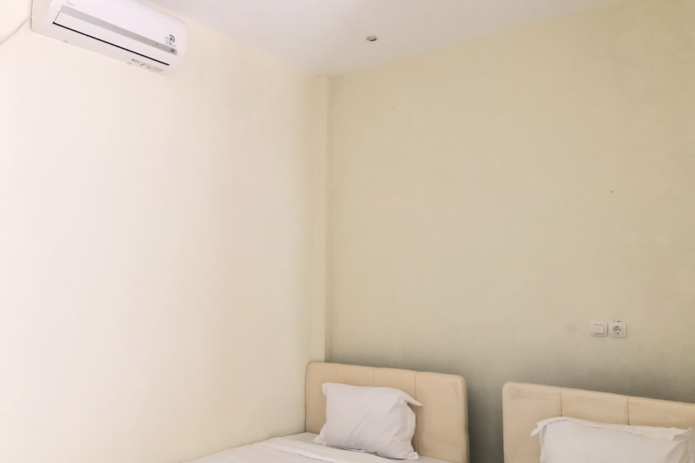 Фото Oyo 90299 Corner Guest House