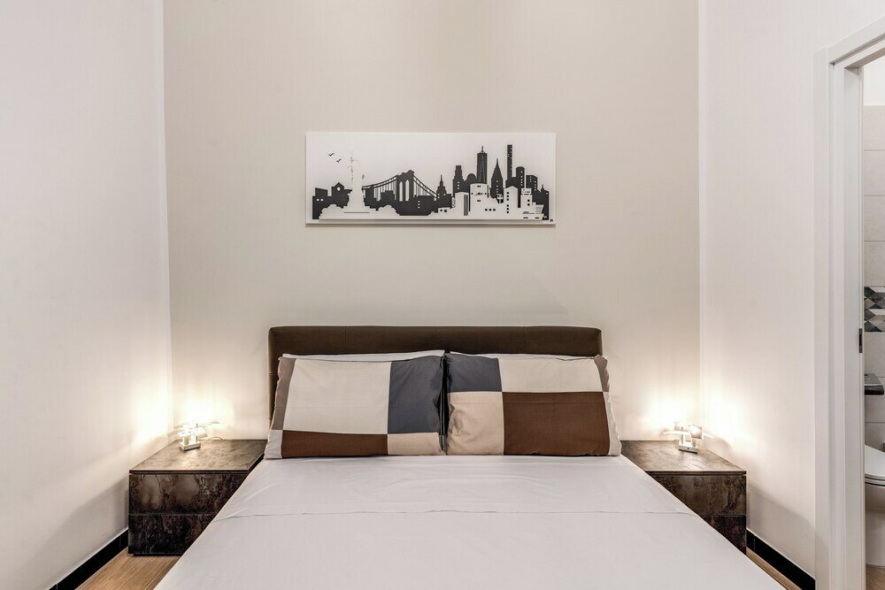 Фото The Quarters Naples Apartment