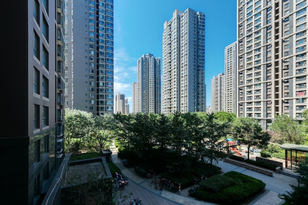 Фото Xiwangju Apart-hotel