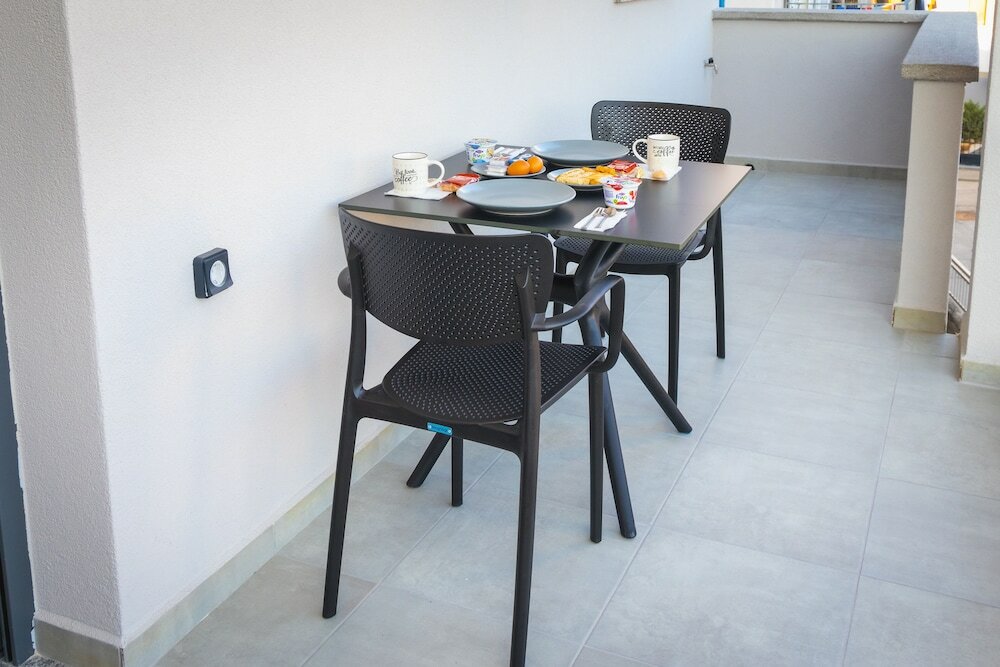 Фото Rafkon Luxury Apartments - Myrina