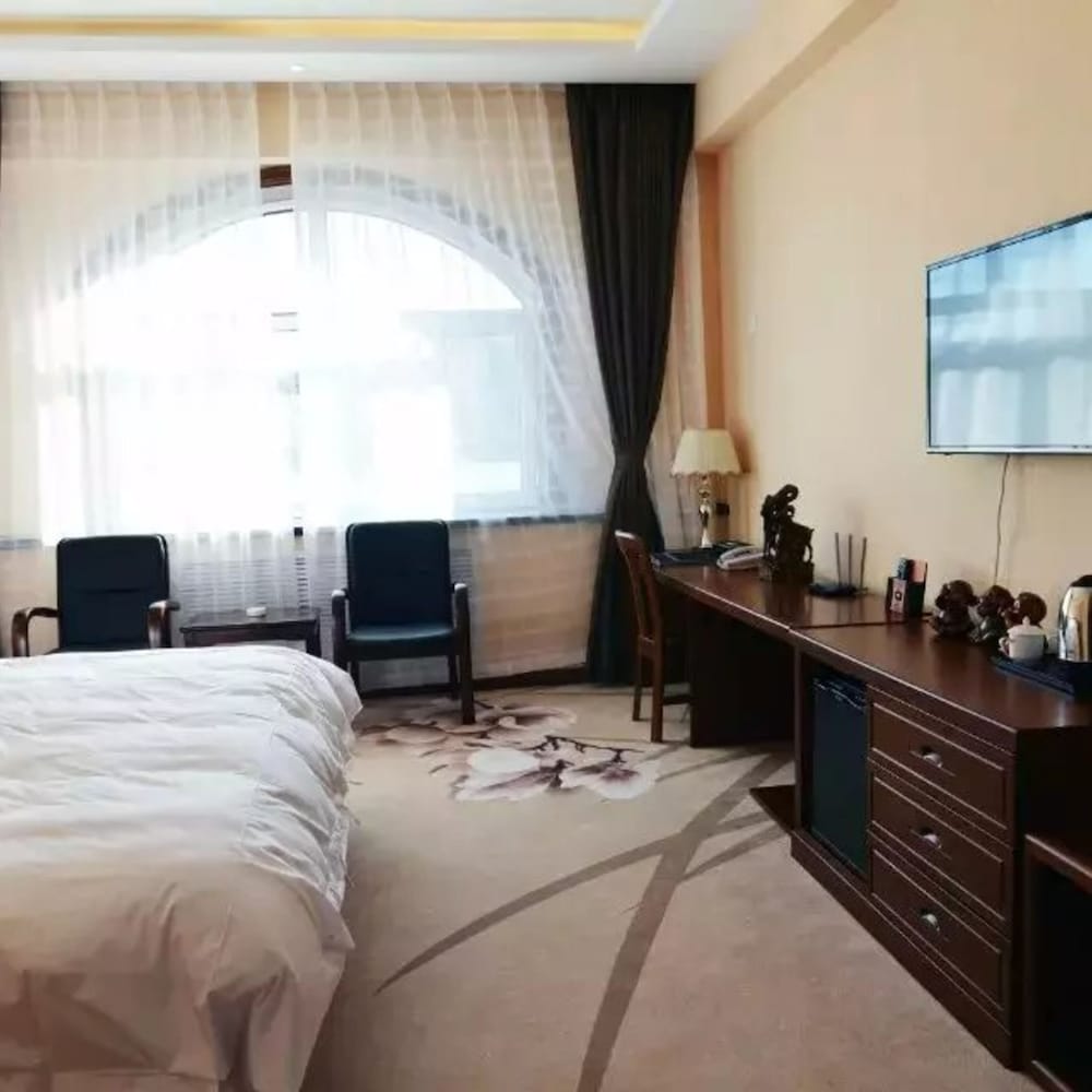 Фото Yuanmaotun Folk Custom Hot Spring Resort