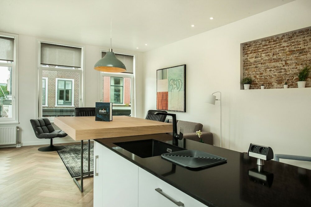 Фото Stayci Serviced Apartments Denneweg