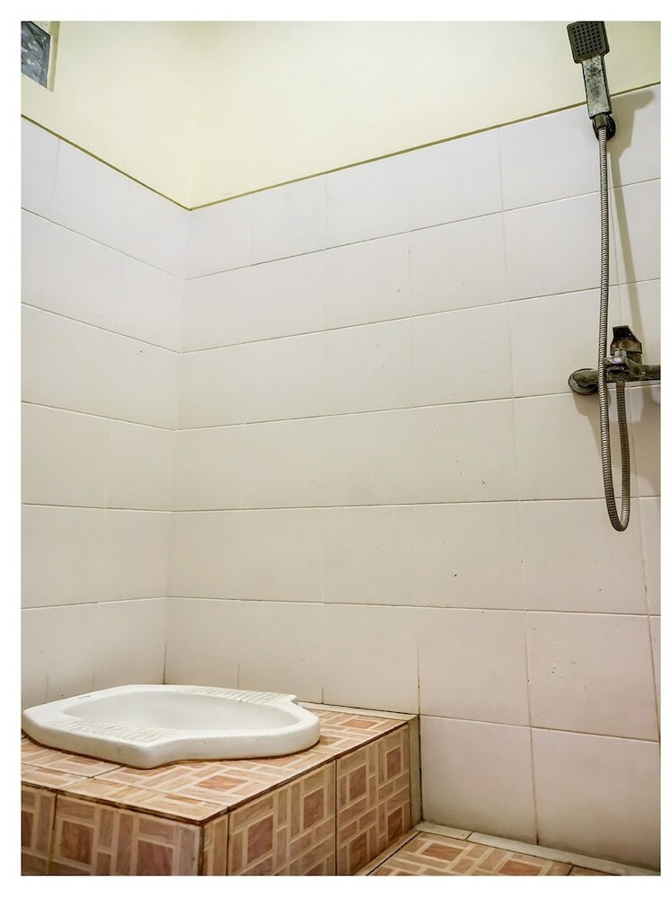 Фото Spot On 91336 Guesthouse Tarumanegara