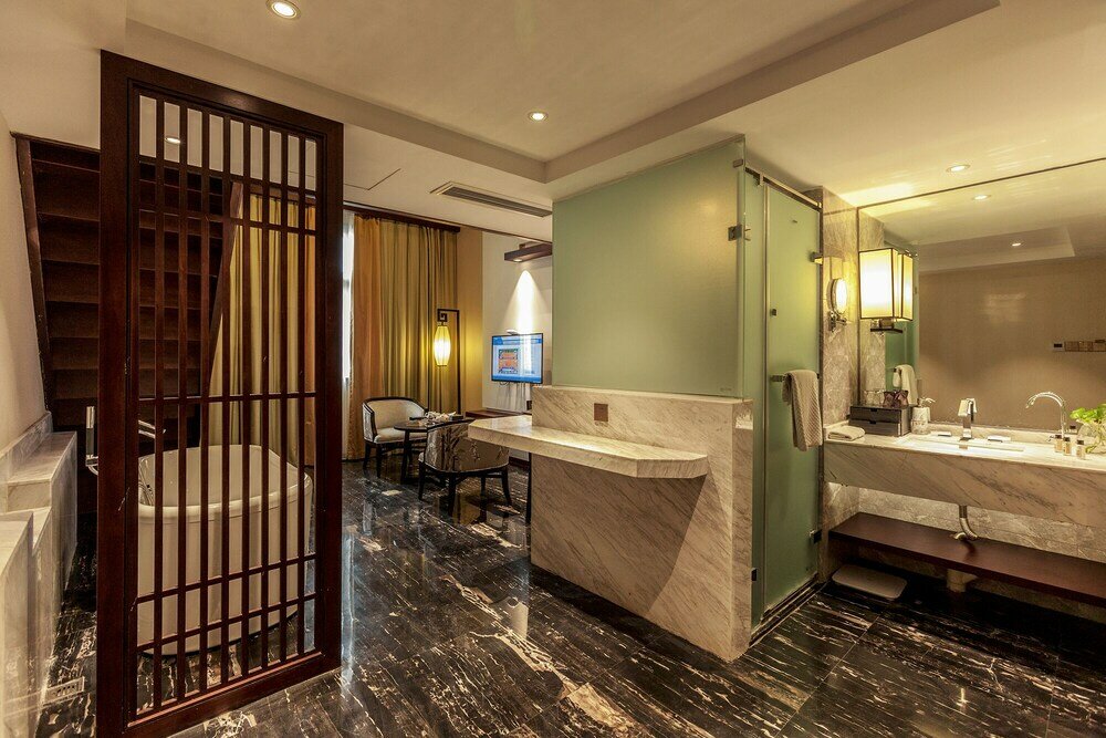 Фото Hejing Chengshang Generations Hotel