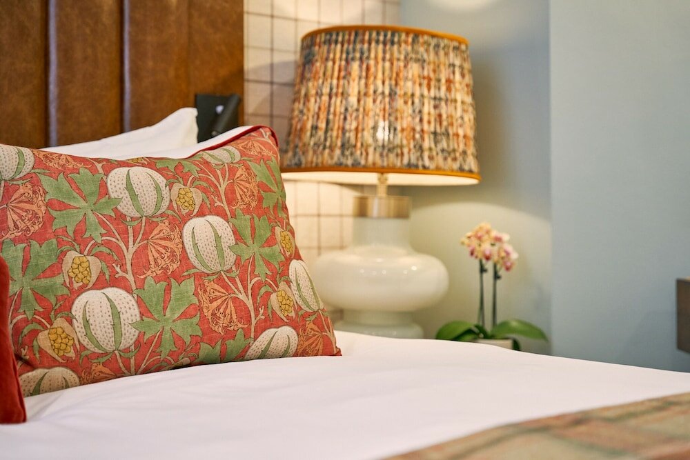 Фото Tophams Hotel