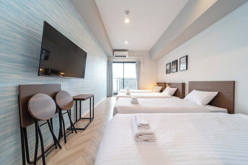 Фото Wellstay Osaka Shinimamiya