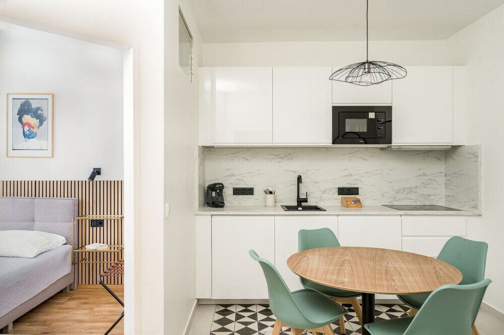 Фото Pappagallo Apartments