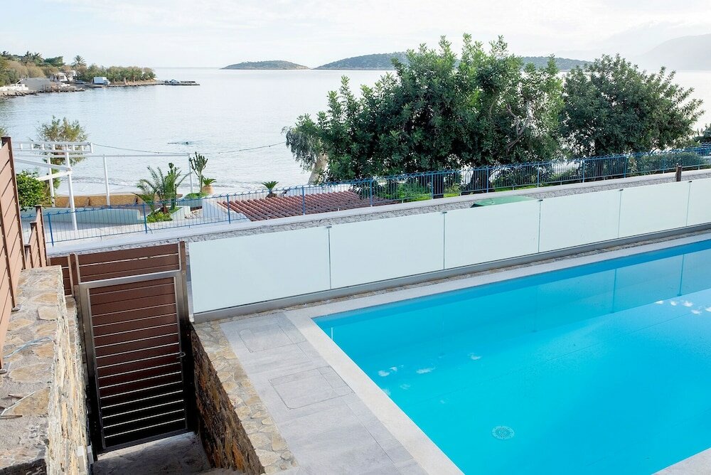 Фото Ammos Luxury Suites