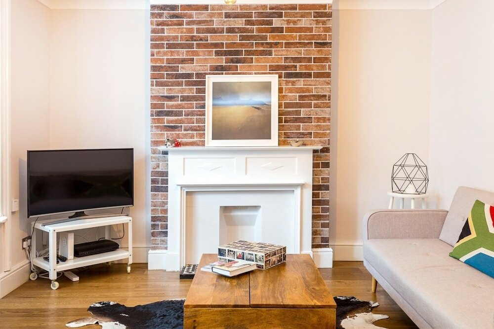 Фото Beautifully Styled, Modern Apartment With Garden