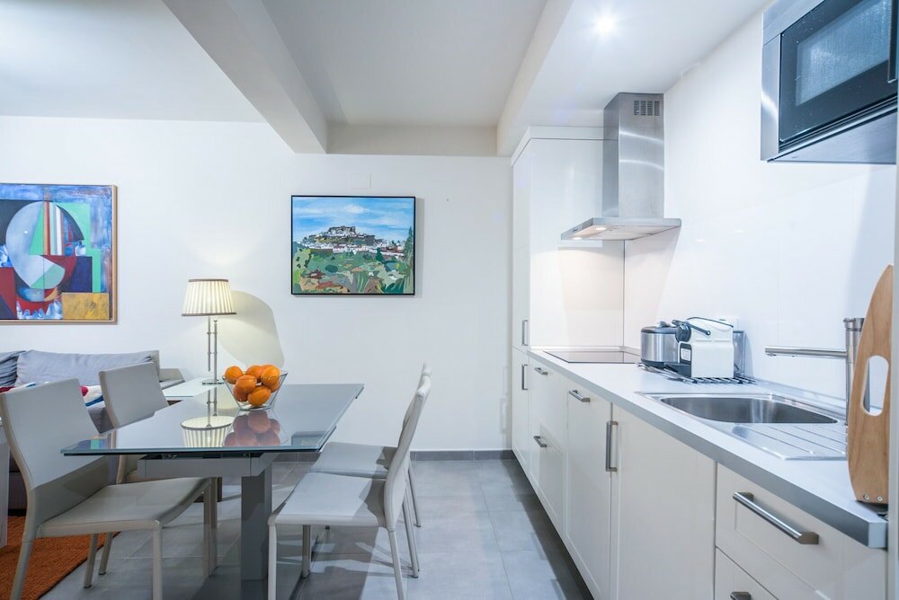 Фото Sercotel Sevilla Guadalquivir Suites