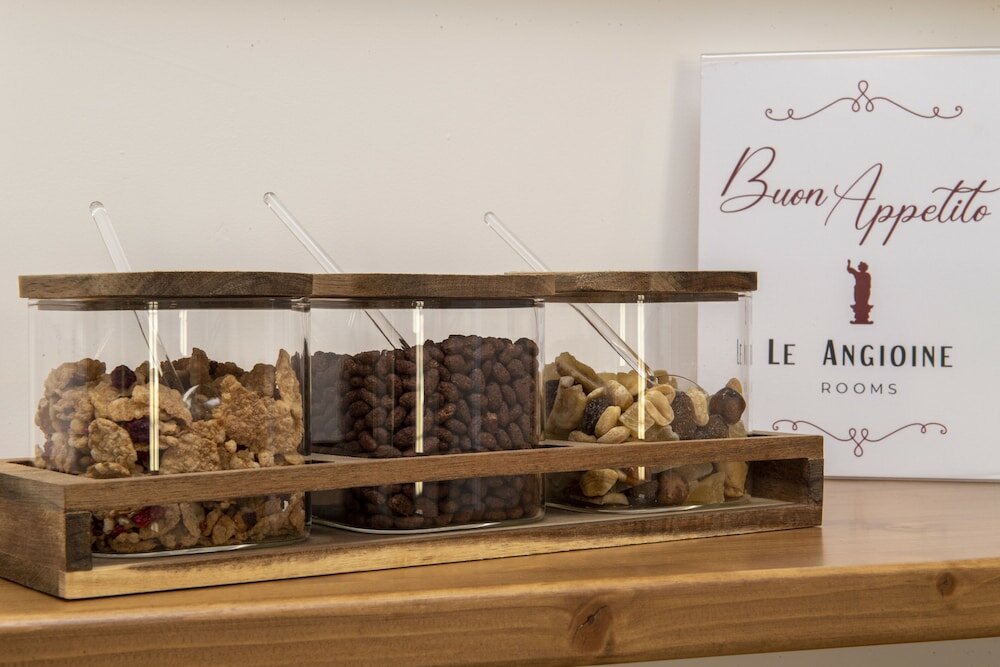 Фото Le Angioine Rooms