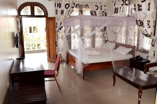 Гостиница Cassa Palace 18 Grand Rooms with Ac в Дар-эс-Саламе