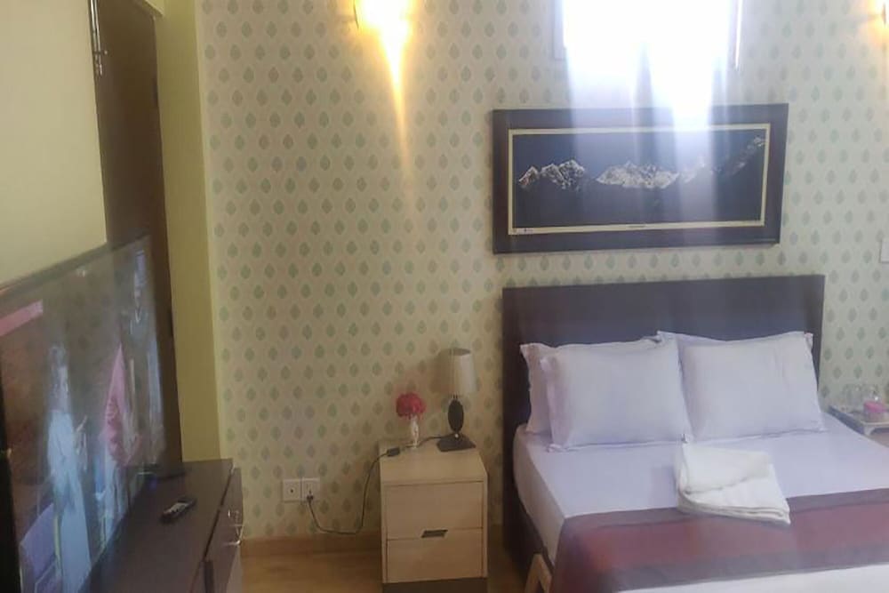 Фото Samakhusi Deluxe Apartment