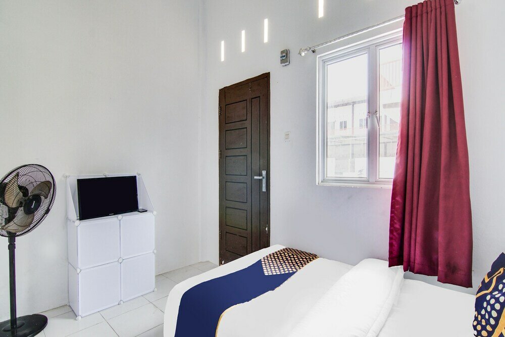 Фото Spot On 91858 Raja Homestay Syariah