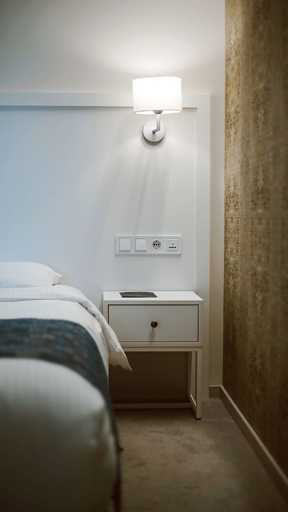 Фото Epigraph Town Hotel