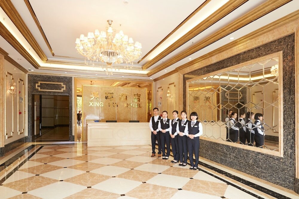Фото Xinghui Hotel Guangzhou