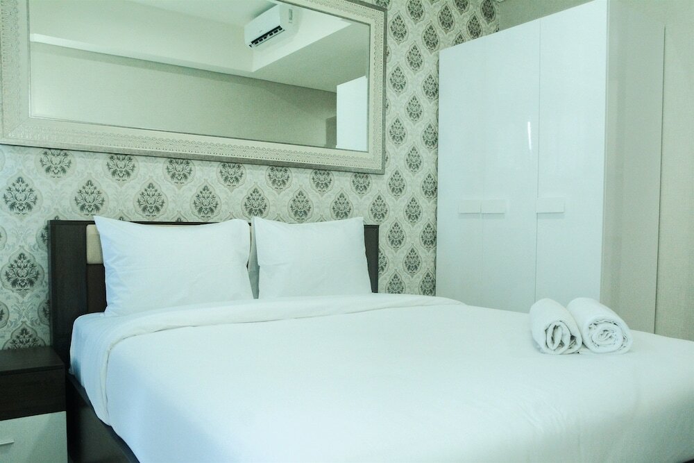 Фото Modern City View Studio Apartment at Puri Mansion