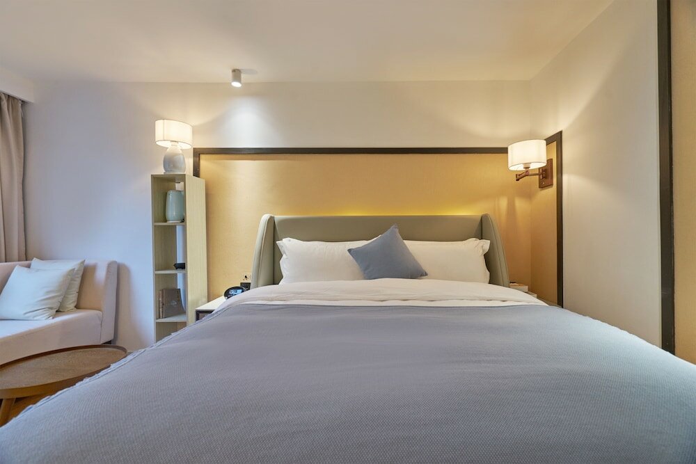 Фото Wuhua Xingxiang Shanfang Hotel