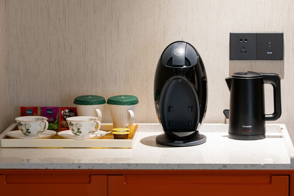 Фото Gz Baiyun Airport MeHood Liz Hotel T1