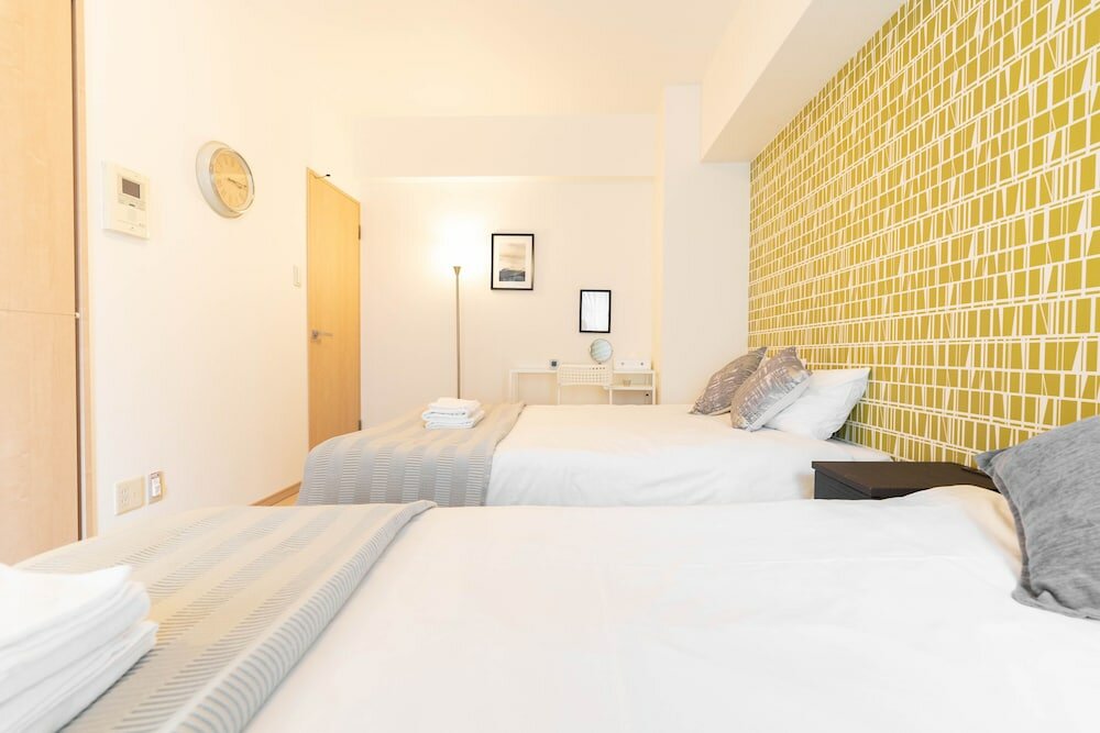 Фото Shinsaibash East Nana Apartment · Junan