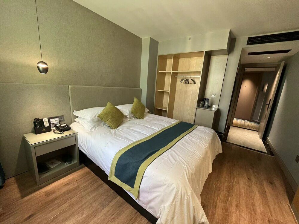 Фото Yiwu Manting City Hotel