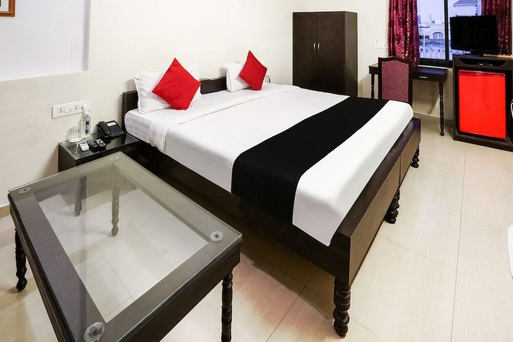 Фото Capital O 48482 Hotel Tribecca Inn