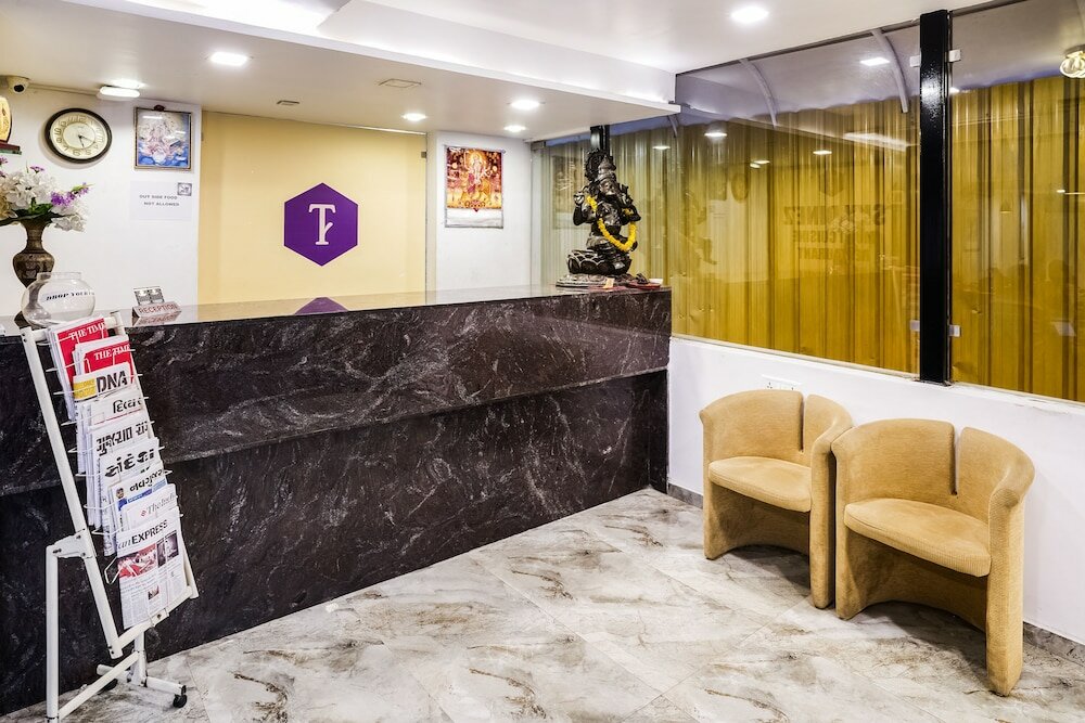 Фото Capital O 48482 Hotel Tribecca Inn