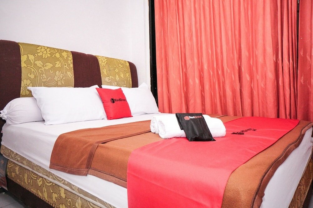 Фото RedDoorz near Palembang Square Mall 2