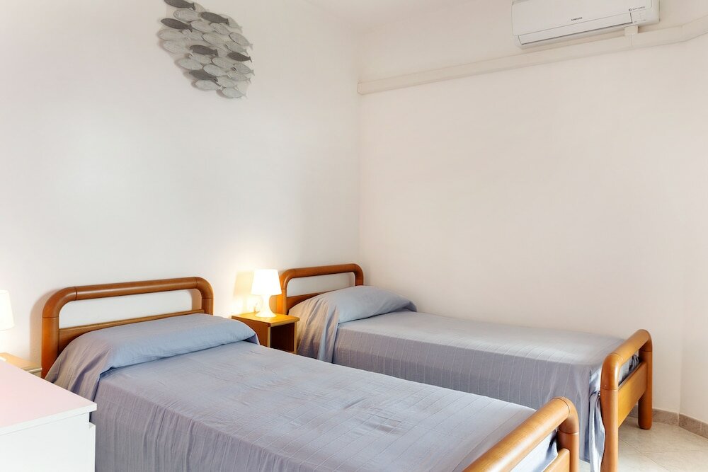 Фото Alghero Vacation Apartment