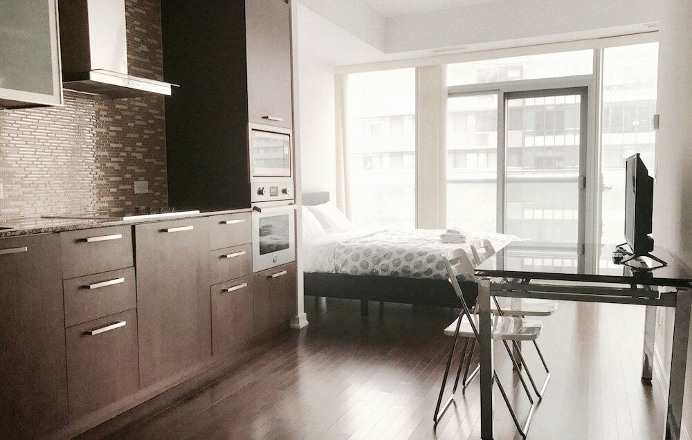 Фото Modern Skyscraper Studio by Cn Tower